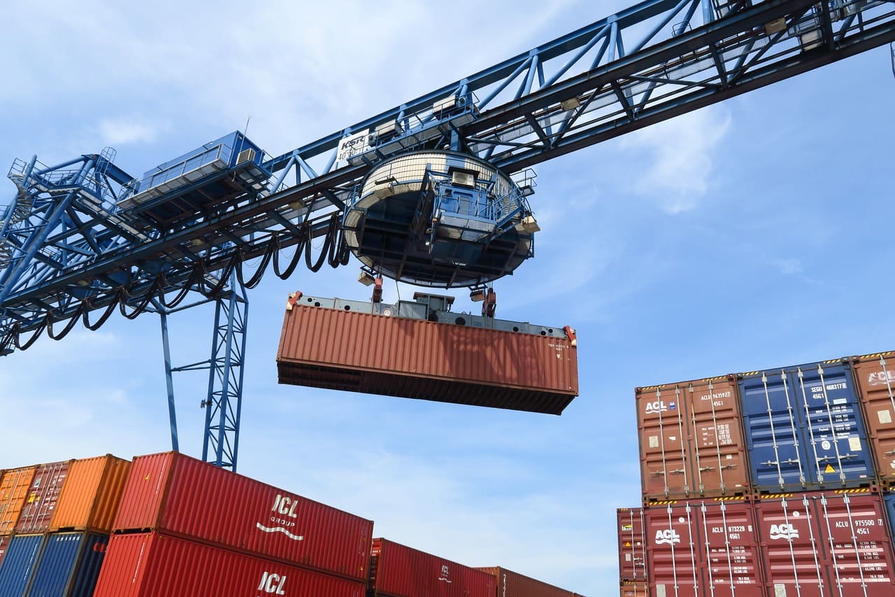 Container being lifted in a port
